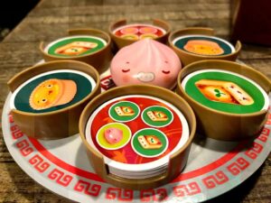 Juego De Mesa Sushi Go! Gira y Come DIM SUM - Imagen 3